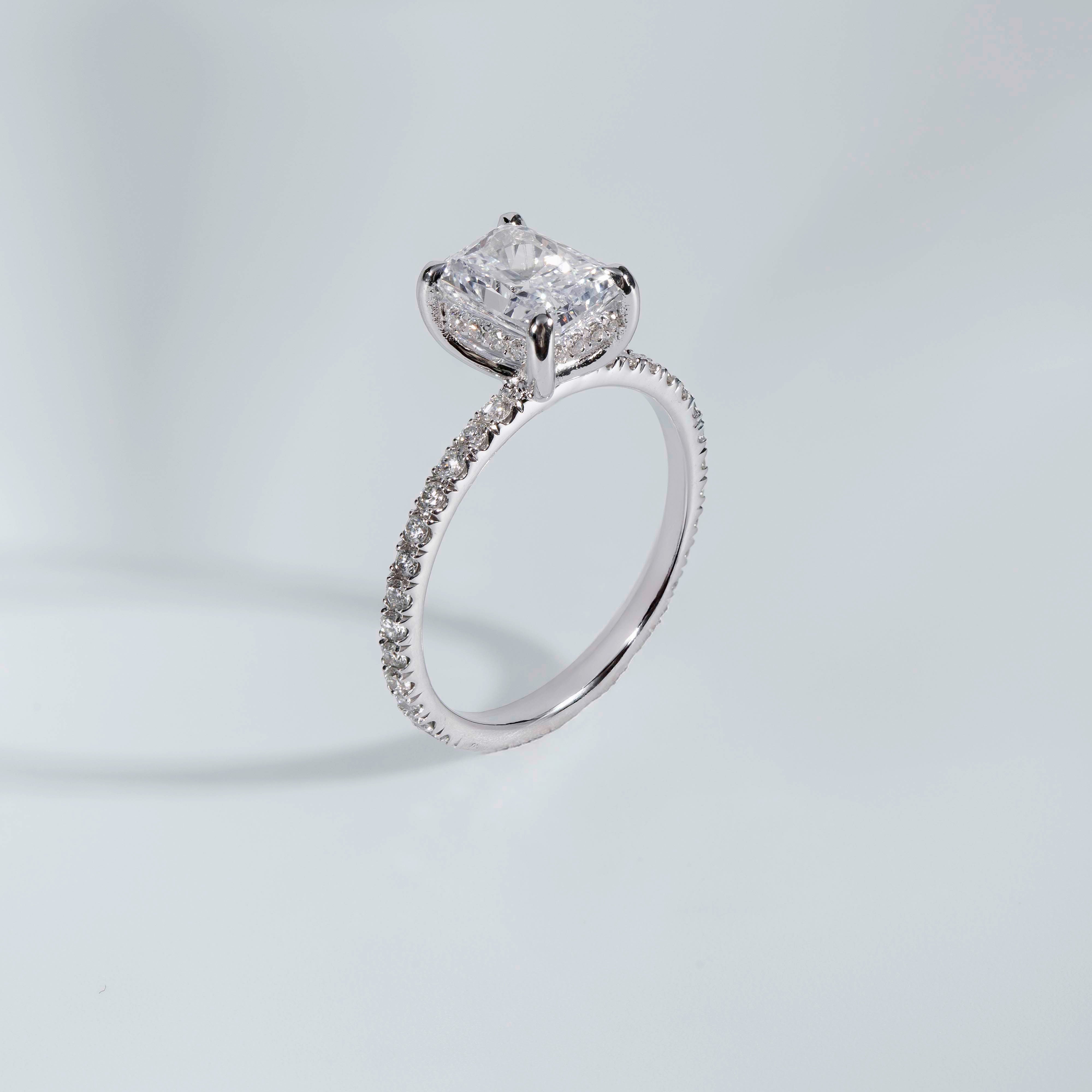 Elongated Radiant Hidden Halo Engagement Ring