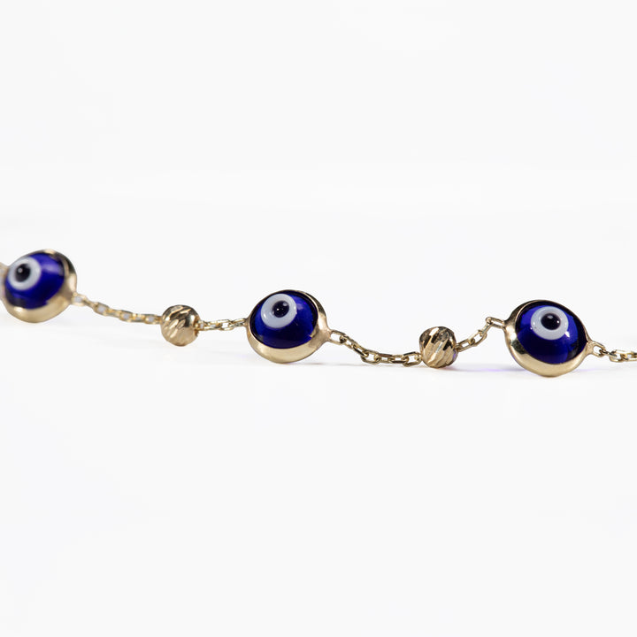 10K Gold Eye Bracelet with Diamond-Cut Beads