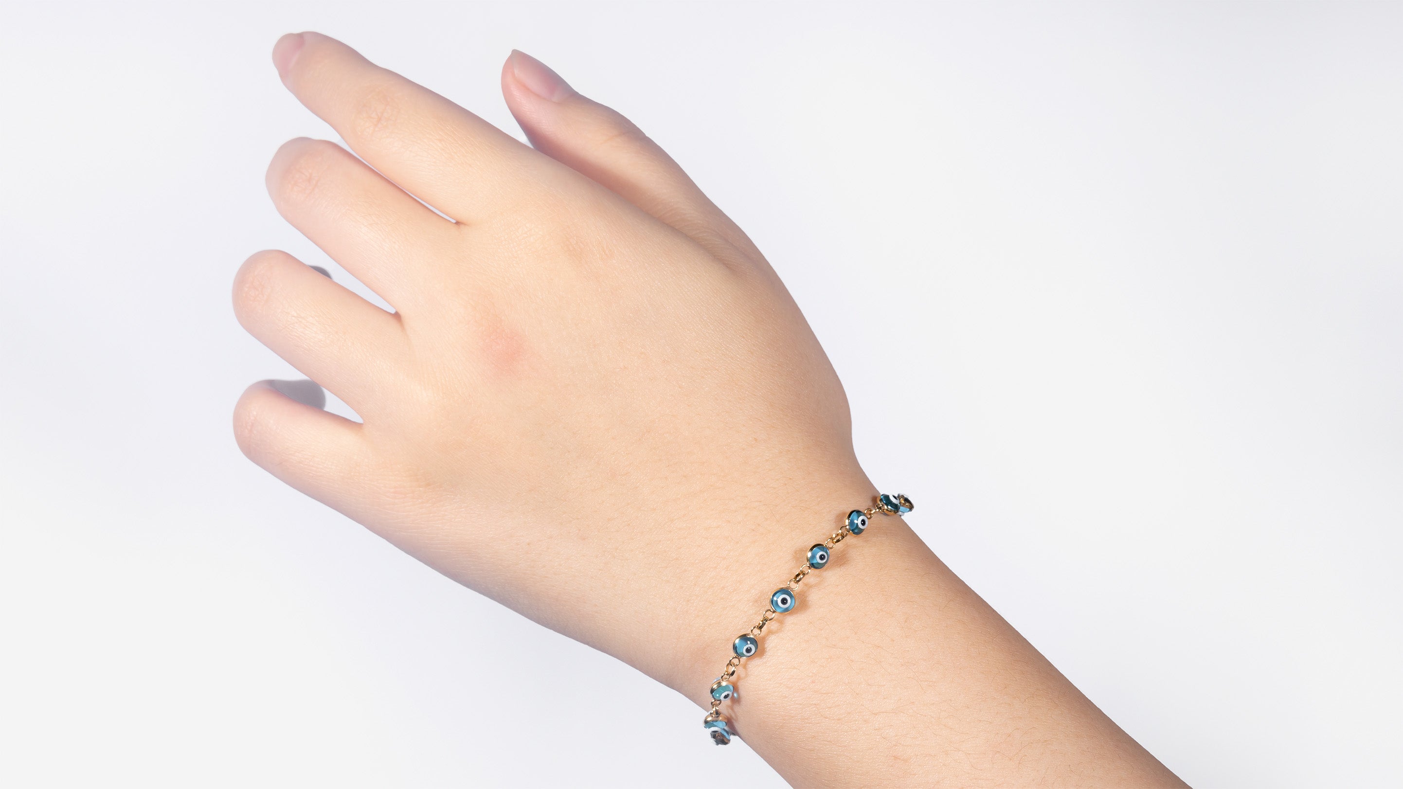 10K Yellow Gold Light Blue Eye Bracelet