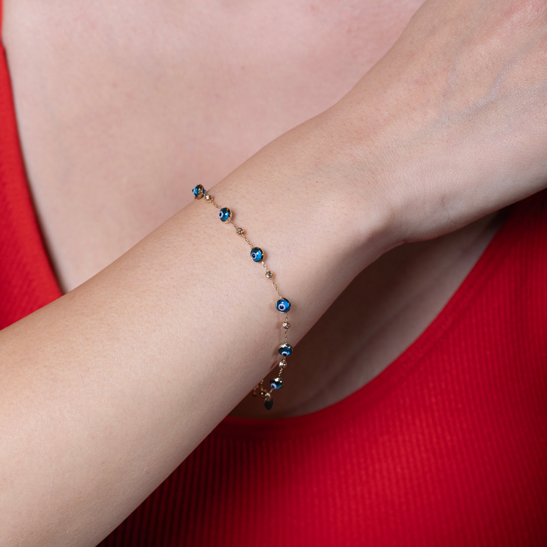 10K Gold Eye Bracelet with Diamond-Cut Beads