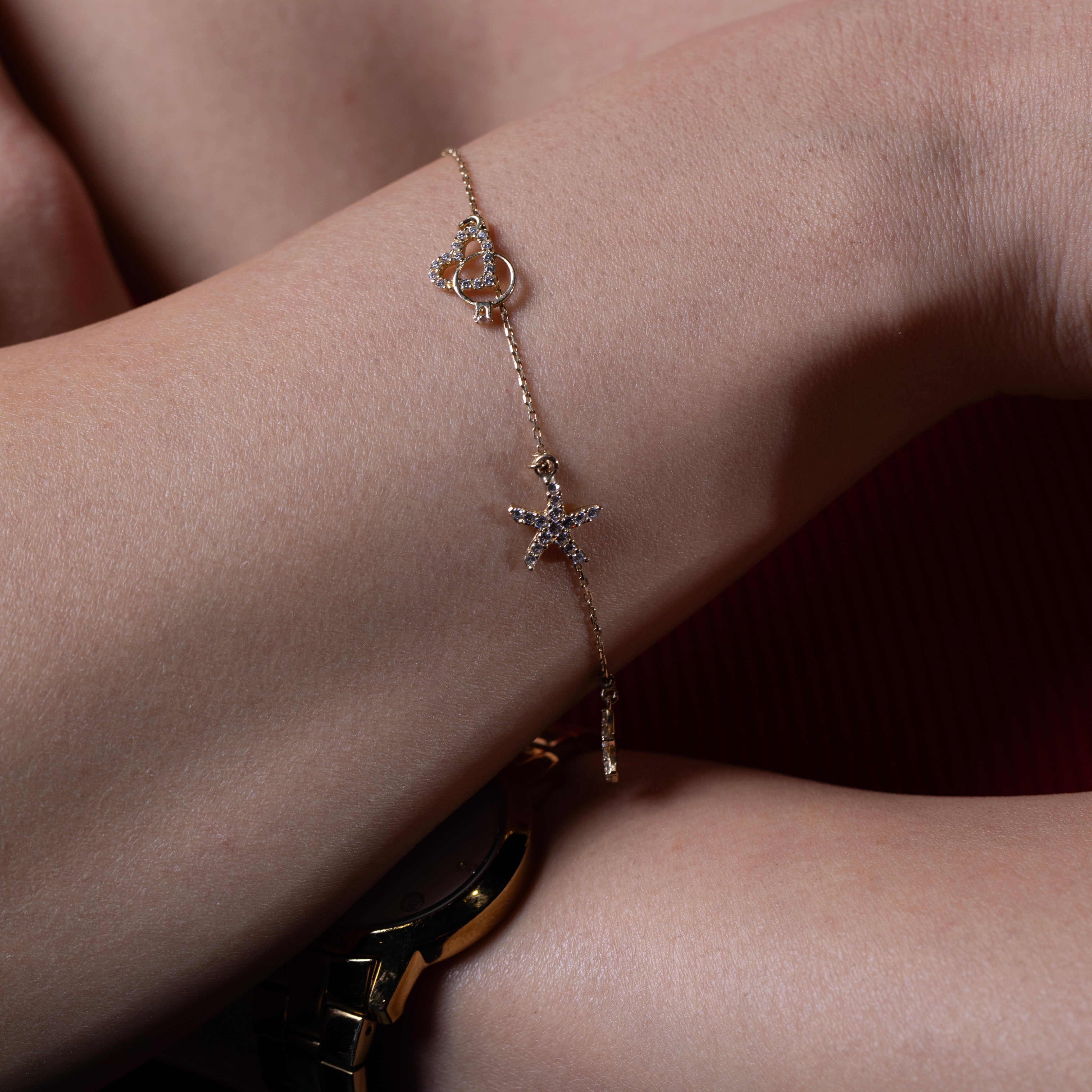 10K Gold CZ Charm Bracelet